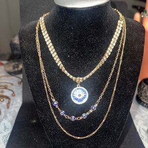 Elegant Gold Layered Necklace with Evil Eye Pendant